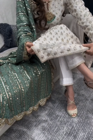 white heavy kurta set with handwork